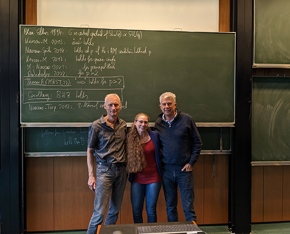 University of Kaiserslautern Professor Gunter Malle, University of Denver Assistant Professor Mandi Schaeffer Fry and University of Valencia Professor Gabriel Navarro pose for a photo after announcing their theorem in Oberwolfach, Germany.