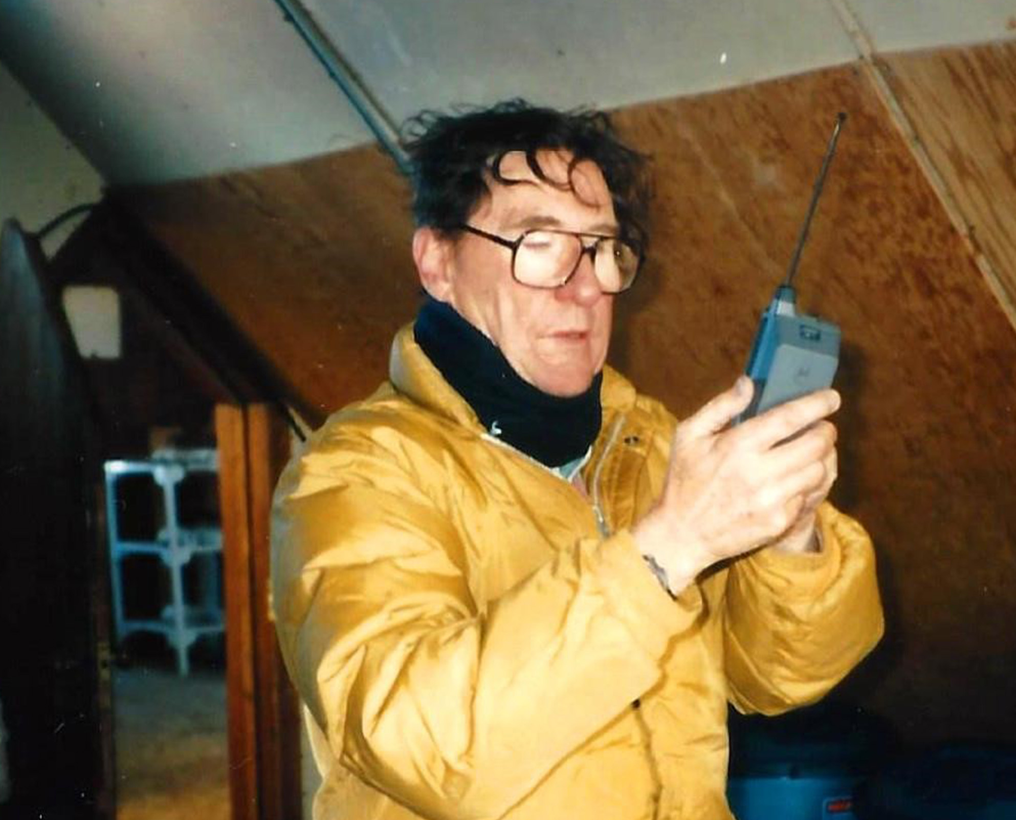 Man with device in cabin