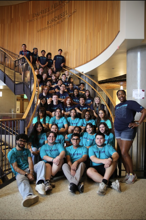 group photo of students sitting on stairs
