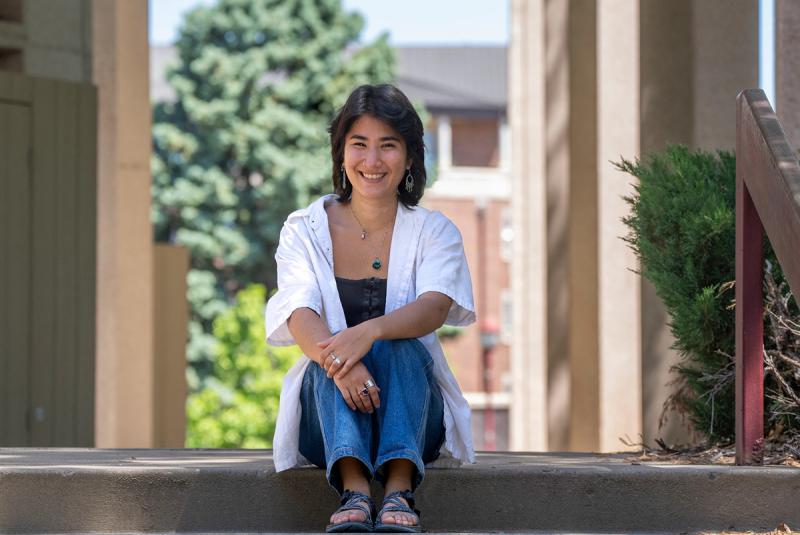 Emmy Radin sits for a photo on the DU campus.