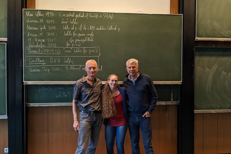 University of Kaiserslautern Professor Gunter Malle, University of Denver Assistant Professor Mandi Schaeffer Fry and University of Valencia Professor Gabriel Navarro pose for a photo after announcing their theorem in Oberwolfach, Germany.