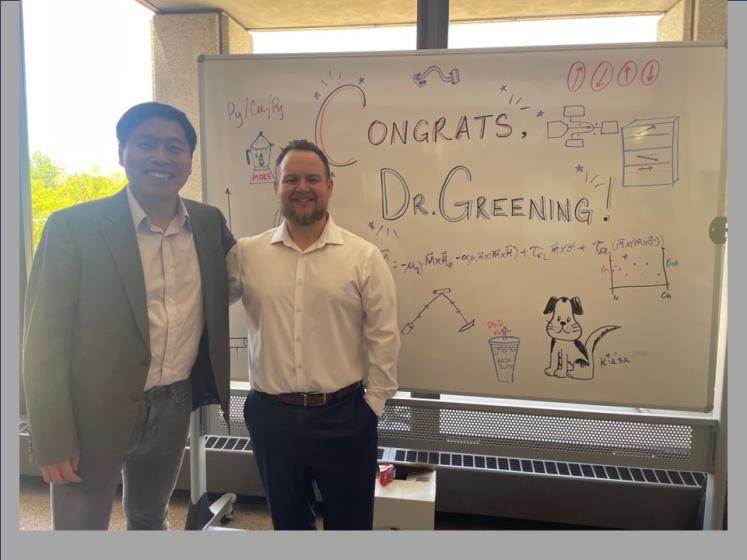 Ryan Greening graduate with PhD