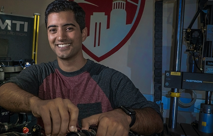 student smiling in lab